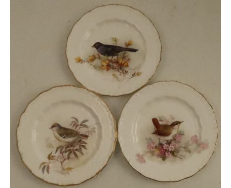 Three&nbsp;Royal Worcester small plates, decorated with a Wren, a Gold Crested Wren and a Blackbird by W Powell, diameter 5.2