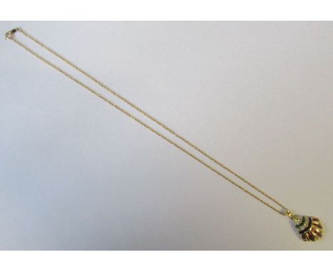 An 18k gold set pendant on chain, set with two rows of brilliant-cut diamonds and channel set row of six calibre-cut emeralds