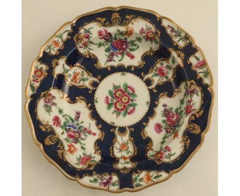 A Worcester scale blue plate, decorated with flowers, seal mark, diameter 9ins - no damage or restoration