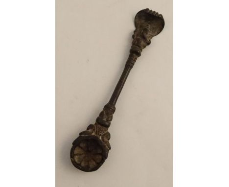 A 19th century Himalyan Buddhist ritual spoon, with Ganesh finial, length 5.5ins