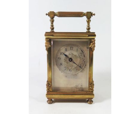 A Small French Brass Carriage Clock with silvered dial retailed by Mappin &amp; Webb, 14,5cm to top of handle