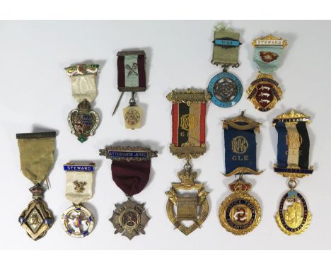 A Collection of Seven R.A.O.B. and Masonic Silver and Enamel Jewels and three others 