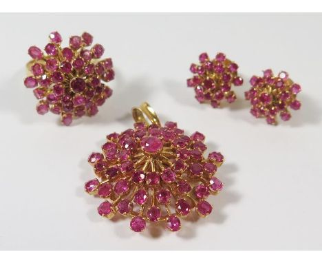 A Starburst Ruby Demi Parure in a high carat gold setting (unmarked), 23.8g ring size N