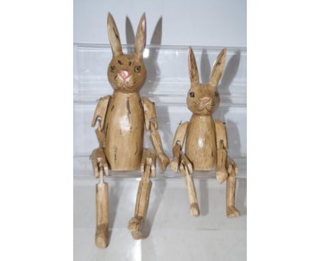 2x Wooden shelf rabbits with articulating limbs