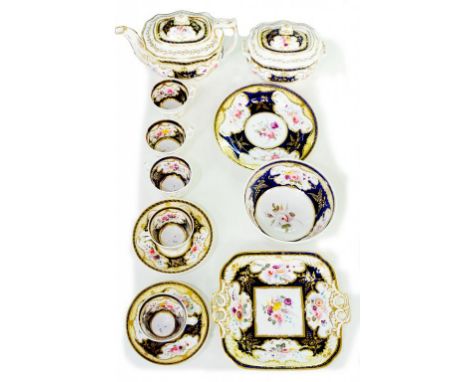 A MINTON COBALT GROUND TEA AND COFFEE SERVICE PAINTED WITH PANELS OF FLOWERS, AND A SIMILAR DAVENPORT STAND, BOTH CIRCA 1825