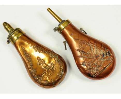 A VICTORIAN COPPER AND BRASS POWDER FLASK, EMBOSSED WITH A SPORTSMAN AND DOG AND ANOTHER FLASK