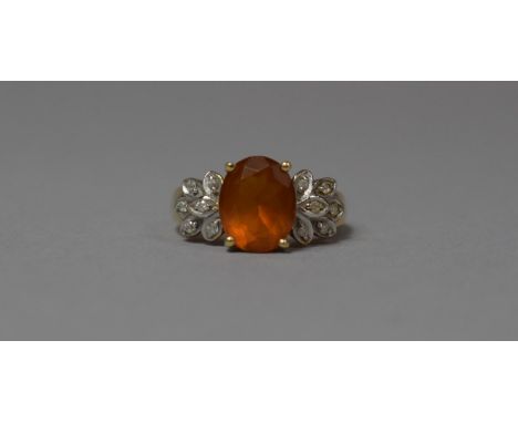 A 9ct Gold Dress Ring with Cushion Cut Amber Stone Flanked by Six Mounted White Stone Chips to Form Leaves, Size K 