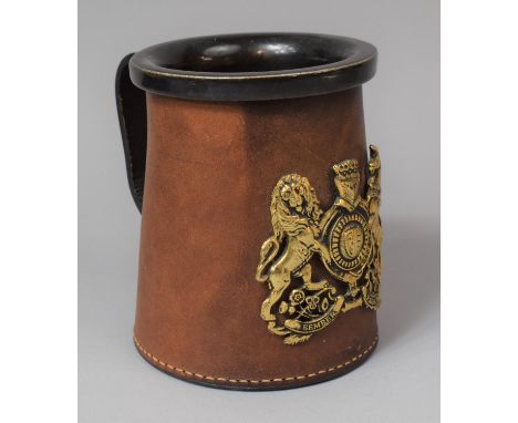 A Contemporary Leather Mounted Ceramic Tankard Having Gilt Royal Coat of Arms Decoration, 12.5cm high 