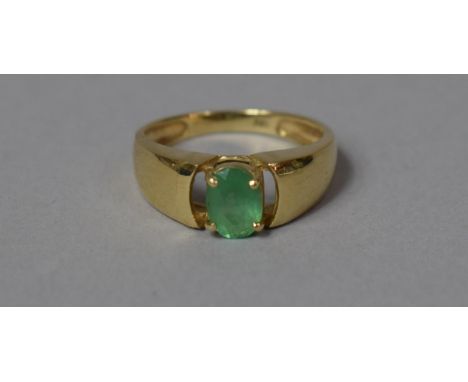 A 9ct Gold and Green Baguette Cut Stone Ring, Size N 