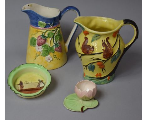 A Royal Doulton Small Bowl, Carlton Ware Lily Pad and Two Decorated Jugs 