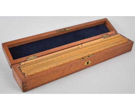 An Edwardian Mahogany Drawing Case Containing Ten Scale Rules, 34cm Wide 