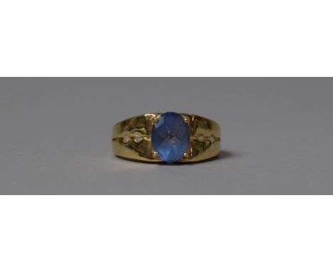 A 9ct Gold and Pale Blue Stone Ring, Size O 