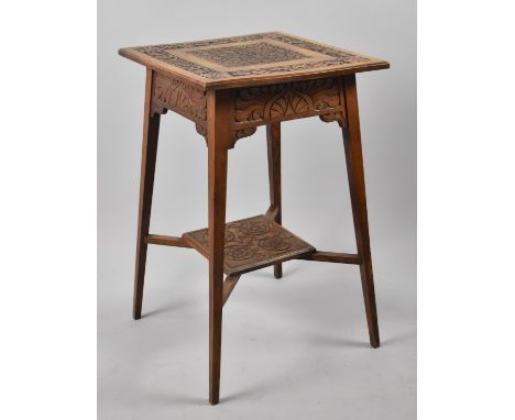 A Mid 20th Century carved Oak Square Topped Occasional table with Stretcher Shelf, 45cm Square and 72cm high 