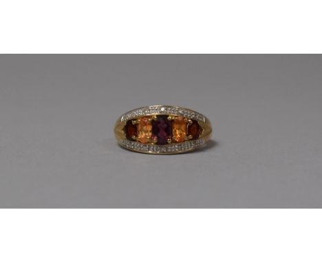 A 9ct Gold with Three Coloured Stone Ring Having Diamond Chips, Size N 