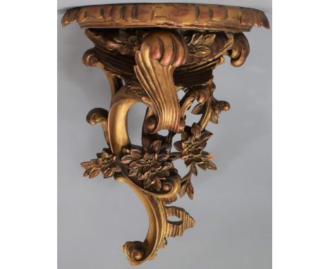 A Modern Moulded Composition Wall Hanging Shelf Sconce in the Rococo Style, 47cm high 