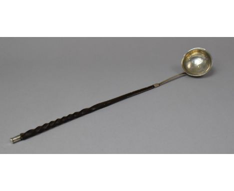 A Georgian Toddy Ladle in Silver with Twisted Baleen Handle, 39cm long 