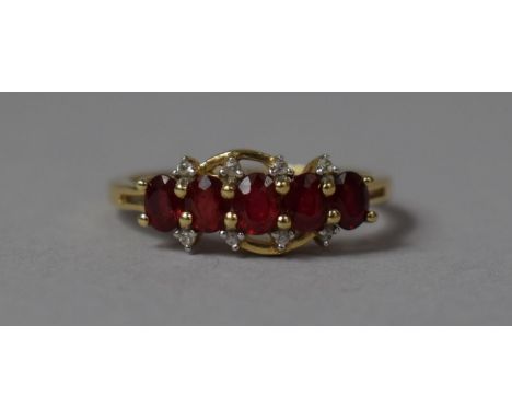 A 10ct Ruby and White Stone Chip Ring, Size N 