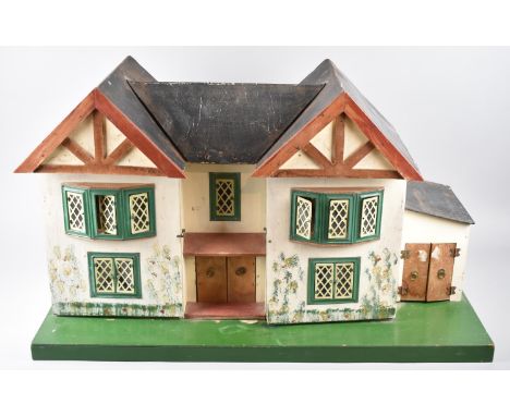 A Mid 20th Century Dolls House with Inner Lighting, Complete with Some Furniture, 70cm wide 