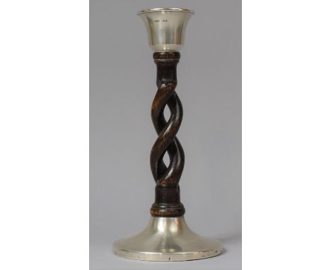 A Silver and Spiralled Oak Candlestick, Hallmarked CP &amp; Co., Chester 1924, 21cm high 