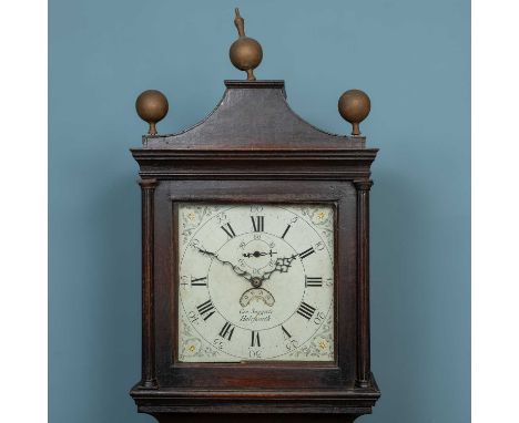 A George III thirty-hour oak longcase clock, the hood with painted gilt finials, the dial with subsidiary second hand and dat