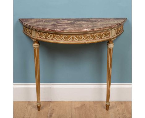 A faux marble effect top console table, carved and painted wood, gilt and cream coloured, on tapered, reeded leg88.5cm wide x