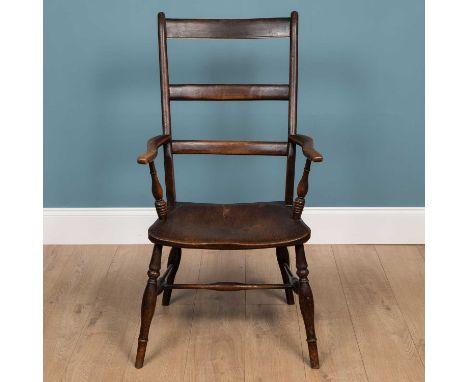 An antique ash and elm high ladder back Windsor armchair57cm wide x 110cm highMinor marks, dents and scratches overall due to