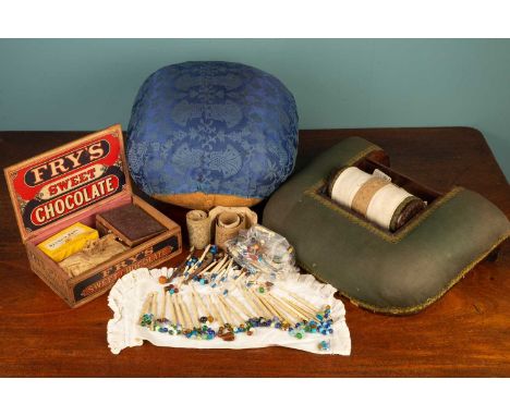A collection of 19th century bone pillow lace making bobbins, some inscribed with names, many decoratively ornamented; a pill