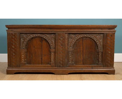 An antique oak coffer constructed from old parts, with arcade panel decoration164cm wide x 50.5cm deep x 75cm highMinor marks