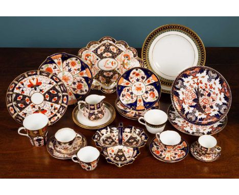 A quantity of Royal Crown Derby porcelain to include plates, cups and saucers, a lozenge-shaped dish etc, many decorated in I