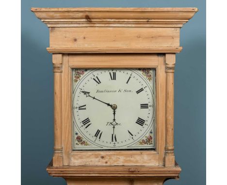 An antique pine thirty-hour longcase clock, the painted dial with flower decorated spandrels, signed 'Tomlinson &amp; Son, Th