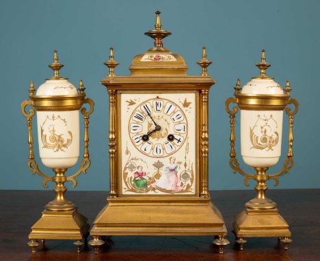 A late 19th century/early 20th century continental gilt cased garniture de cheminée, with ceramic mounts, the French movement