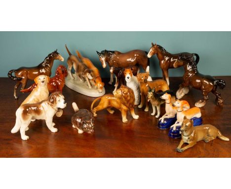 A Royal Dux porcelain group modelled as two pointer dogs in a naturalistic setting, 30cm overall; and sixteen further china a