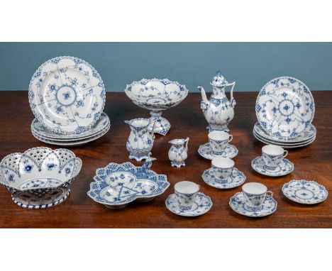 A Royal Copenhagen blue and white floral porcelain part dinner service, comprising of two large dinner plates, two latticed e