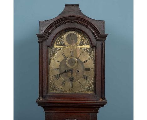 An antique oak longcase clock, the brass dial with subsidiary second hand, date aperture and strike silent indicator, signed 