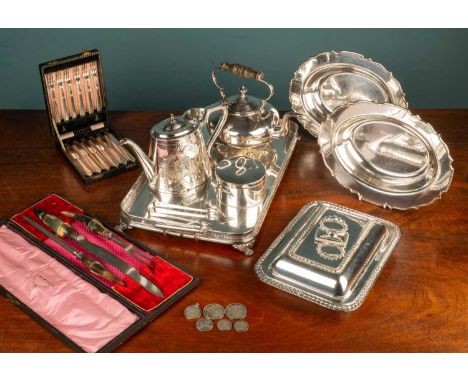 A quantity of silver plate comprising of one large silver plated tray, a silver plated teapot, a lidded sugar pot, two silver