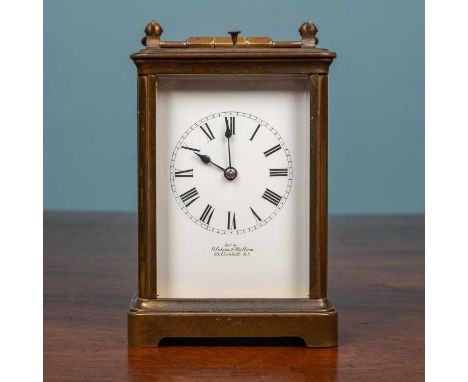A brass carriage clock signed 'Alstons &amp; Mallam'14cm high x 9.5cm wide