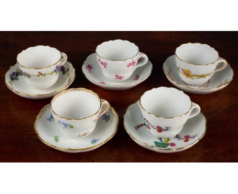 Five Meissen miniature cups and saucers, circa 1920, each of a different pattern, the saucers 10.5cm diameterAll with only ve