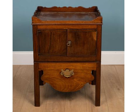 A 19th century mahogany commode cupboard with galleried top, twin cupboard doors to the front and pull-out step59cm wide x 49