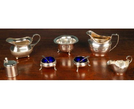 A quantity of silver comprising of three silver jugs; a sugar basin; two salts; and a mustard pot, total weight: 588gQty: 7Th