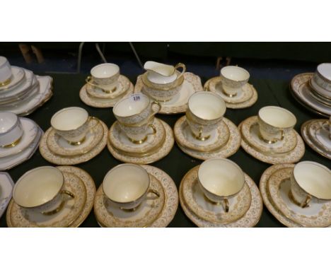A Collection of New Chelsea Gilt Decorated Tea Wares To Comprise Ten Trios, Two Cups and Saucers, Two Cake Plates, Sugar and 