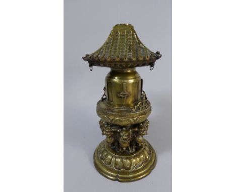 A Chinese Polished Bronze Censer in the Form of Pagoda Supported on Foo Dogs, 32cm High 