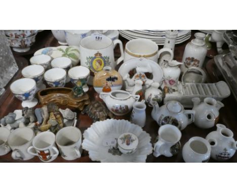 A Tray of Ceramics to Include Crested Ware Items, Wade Whimseys, Commemorative Mugs, Coalport Egg Cups Etc