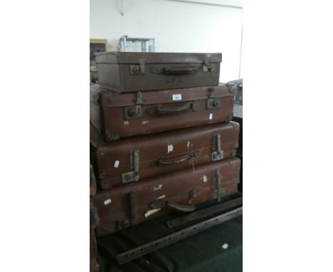 A Collection of Four Vintage Suitcases 