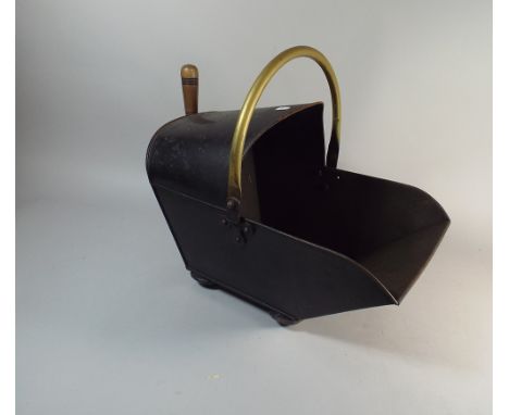 A Brass Mounted Toleware Helmet Shaped Coal Scuttle with Shovel, 46 cm Long