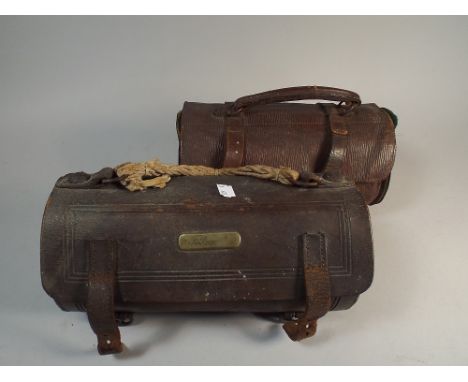 Two Pairs of Leather Cased Lawn Bowls 