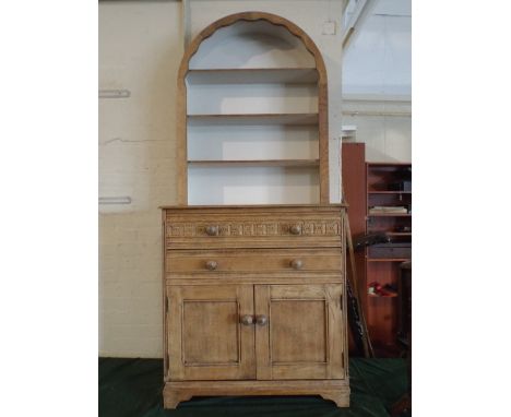 An Edwardian Oak Dresser, The Base with Two Long Drawers over Cupboard, Arched Three Shelf Plate Rack, 79 cm Wide