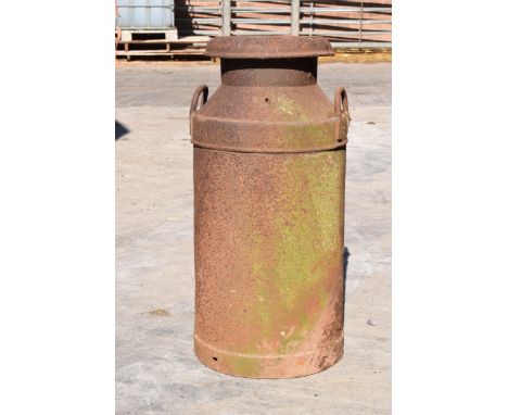 A vintage early to mid 20th century milk churn. 72.5cm tall.  