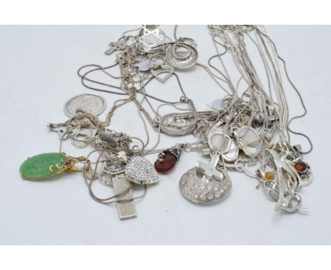 A large collection of silver jewellery to include chains, silver gilt jade-style pendant and many others, 199.7 grams.  Some 