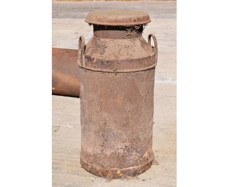 A vintage early to mid 20th century milk churn. 72.5cm tall.  