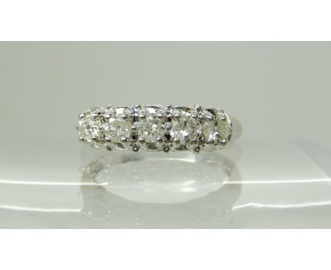 A 14k white gold five stone diamond ring set with estimated approx 0.50cts of brilliant cut diamonds, size M, weight 2.6gms C